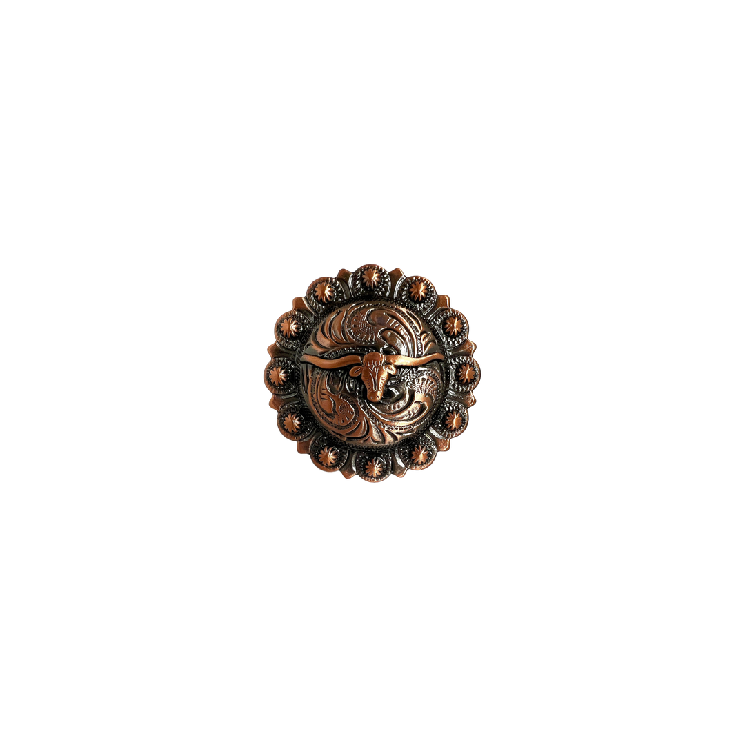 Decorative metal concho for leather belt with intricate design on a white background